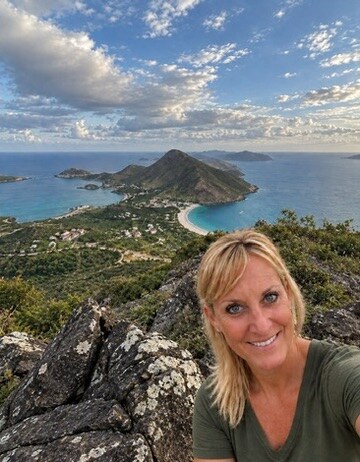 Megan overlooking the coastline and mountains of St. Kitts